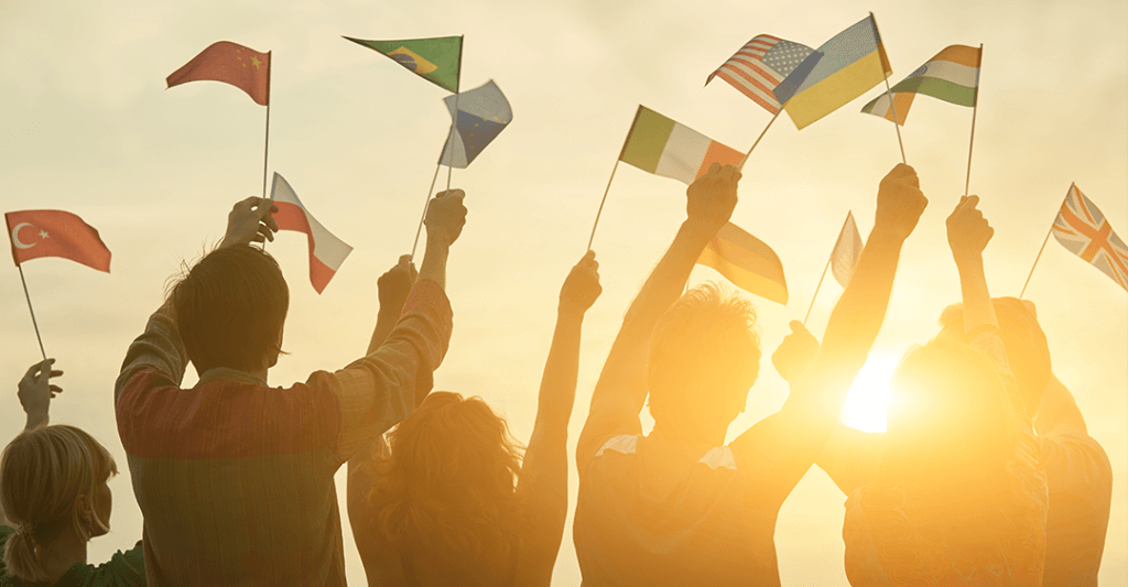 Hague Convention, Hague Conference, International Treaty, intergovernmental initiative, People holding different flags. Back view. Sunny evening sky background.