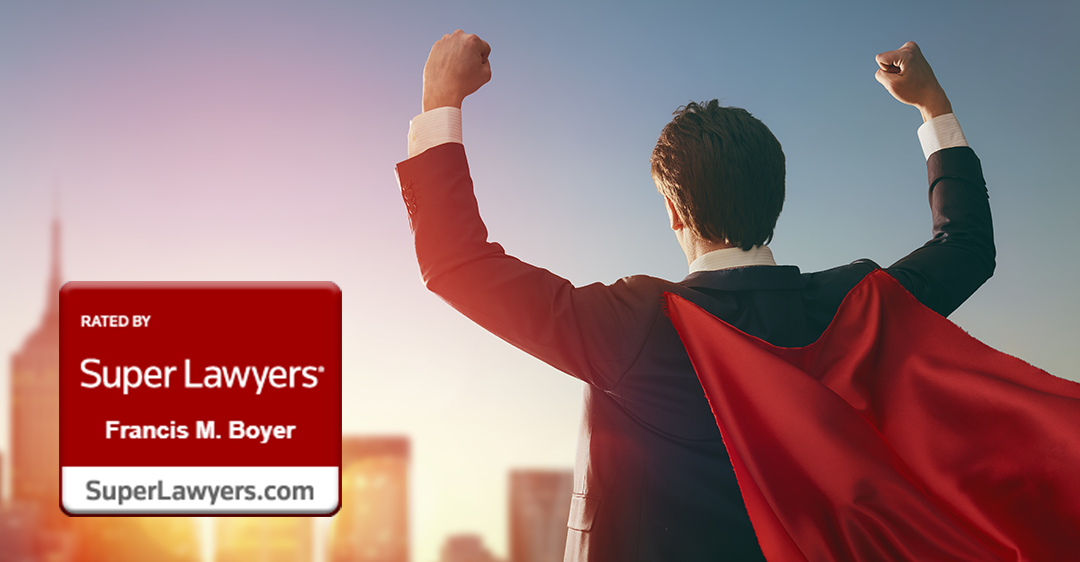 man in suit and red cape facing sunset on city with fists raised, Francis M. Boyer, 2020 Super Lawyer, Board Certified Expert, international law