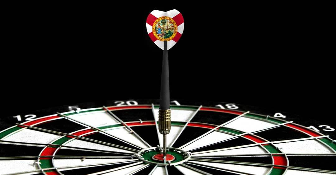 state of florida flag on dart flight, dart tip in bullseye of dartboard, Move your business to florida