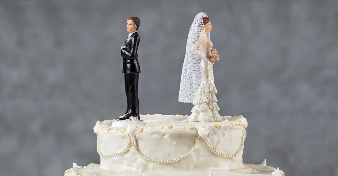 bride and groom topper on wedding cake facing away from each other , The Consequences of Divorce on Your Estate Plan