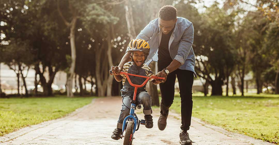 father pushing child on bicycle, impact of child support obligations on second marriage