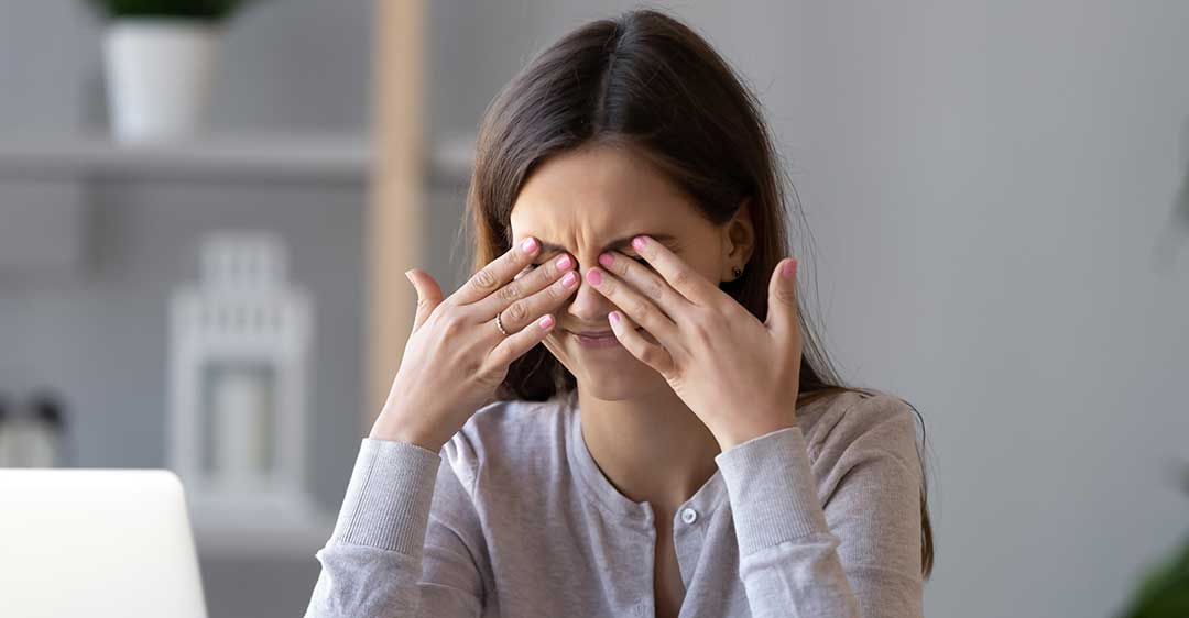 woman rubbing eyes, headache, problem, obstacles, common probate complications in Florida
