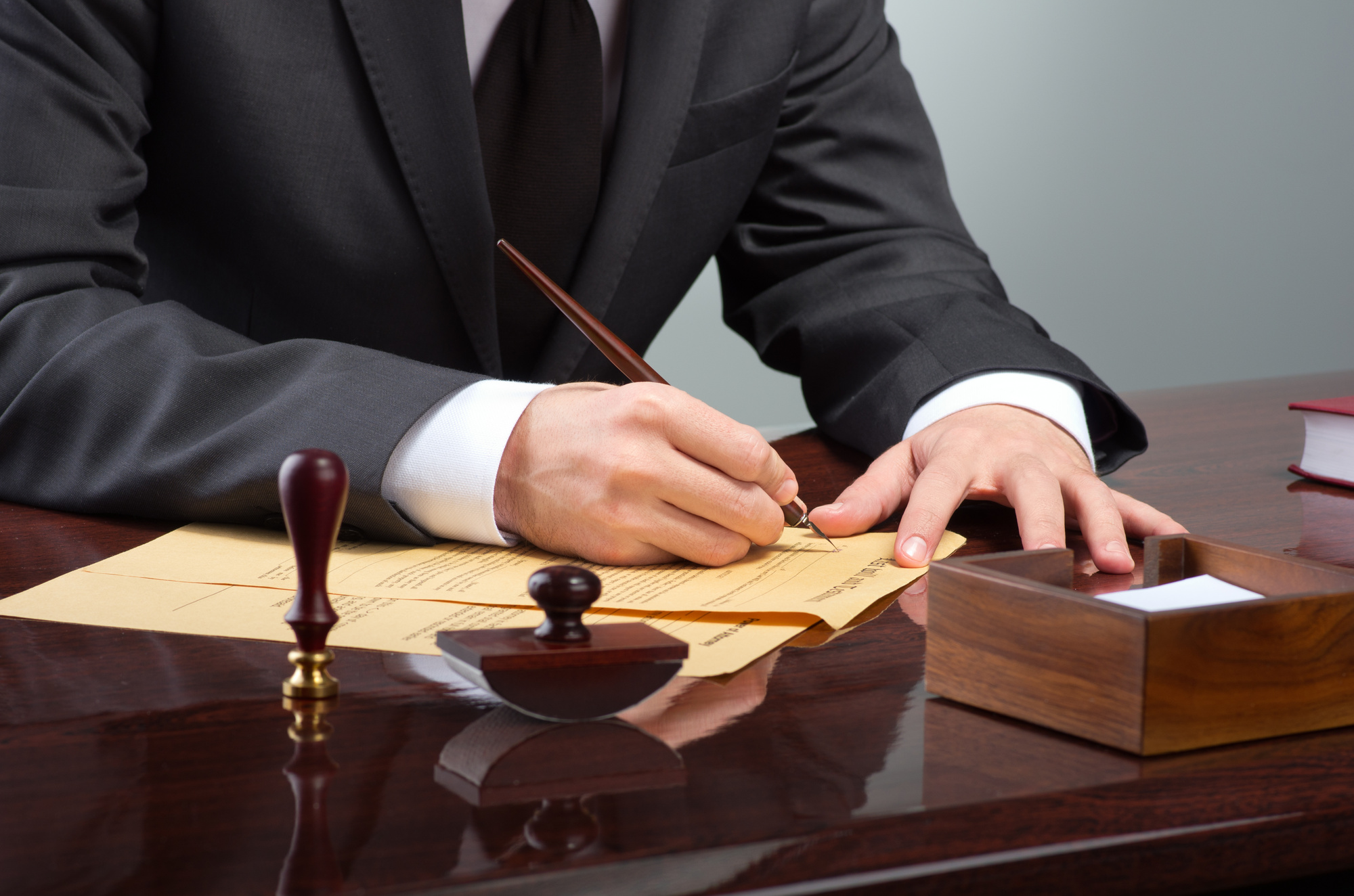 lawyer preparing document, international business lawyer