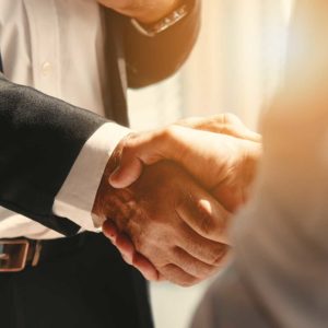 businessmen shaking hands, alternative dispute resolution, mediation, arbitration