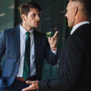 businessmen arguing, commercial litigation, business disputes