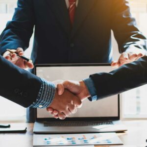 business people shake hands, florida business lawyer
