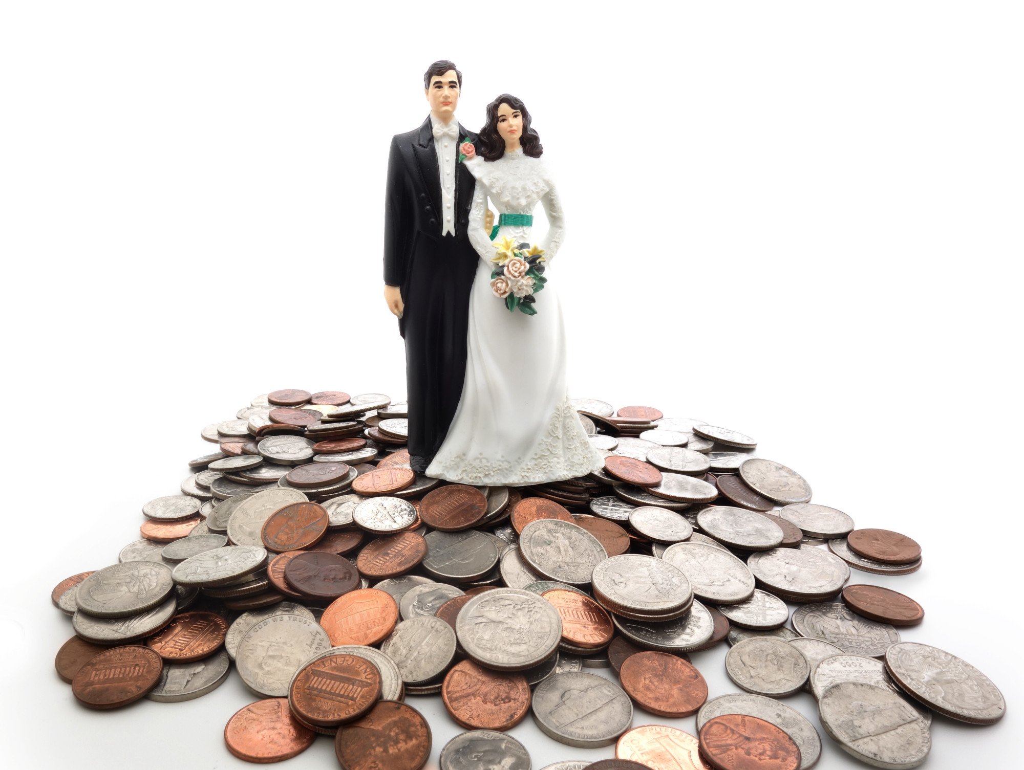 model bride and groom on top of US coins, international marriage, prenup