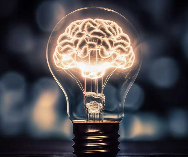 light bulb with illuminated brain inside, intellectual property