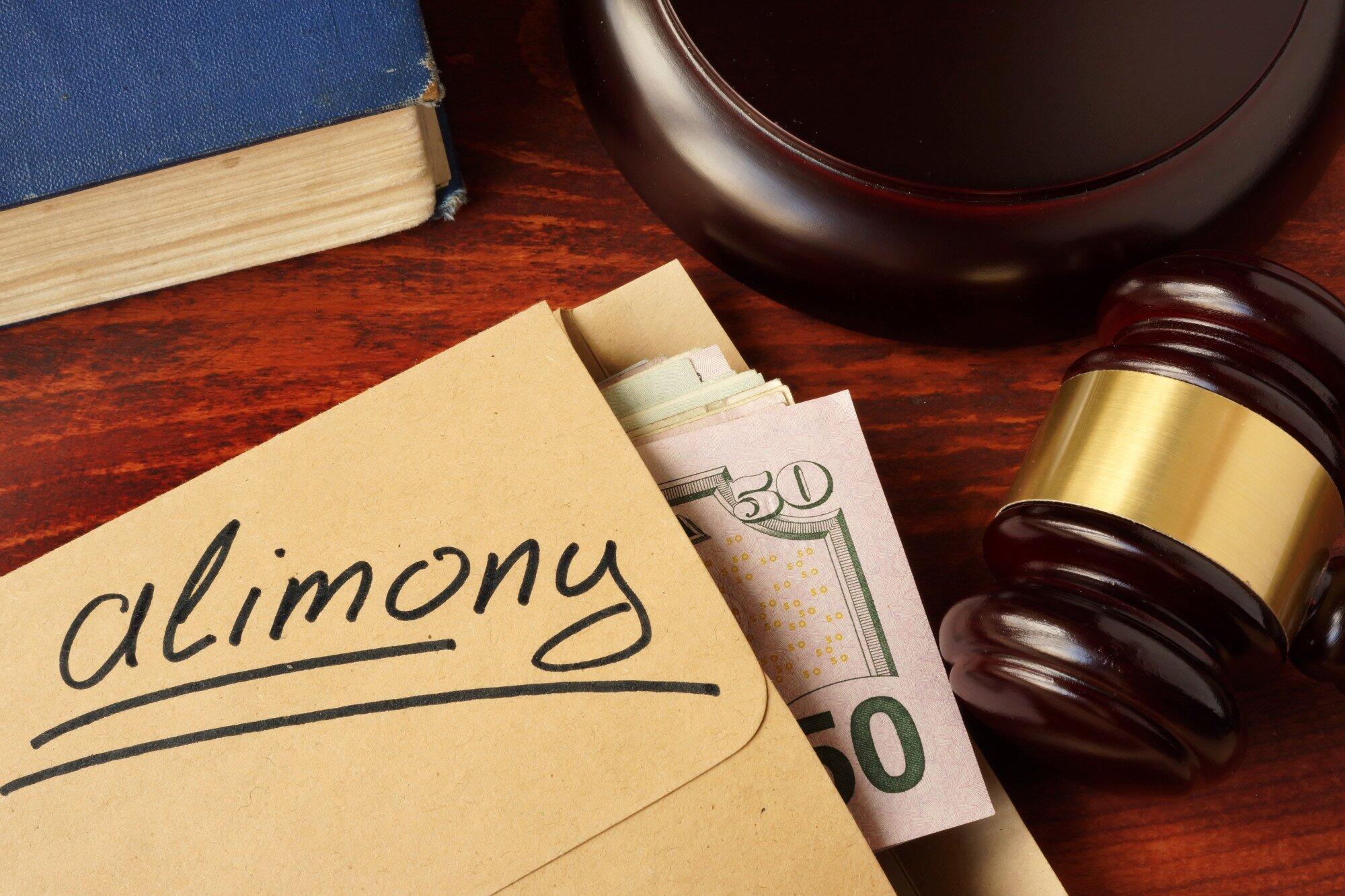 gavel, cash inside envelope with alimony written on outside, florida permanent alimony