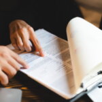 business approve and certificate concept, confirmation of business marketing document permit and certified stamping, signing on business partner paper to success, or concept of attorney and insurance