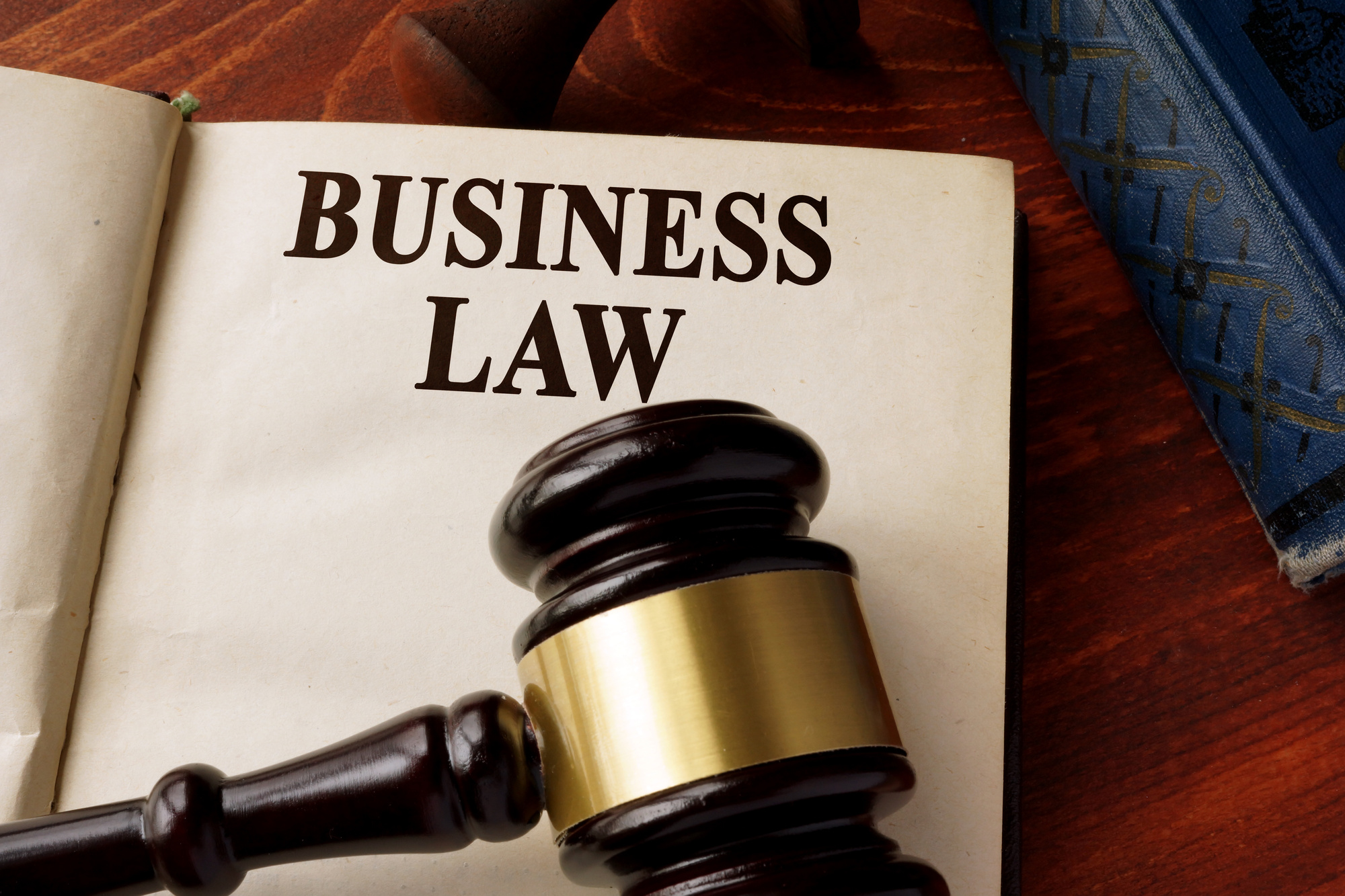 open book, gavel, words business law, beginners guide to business law