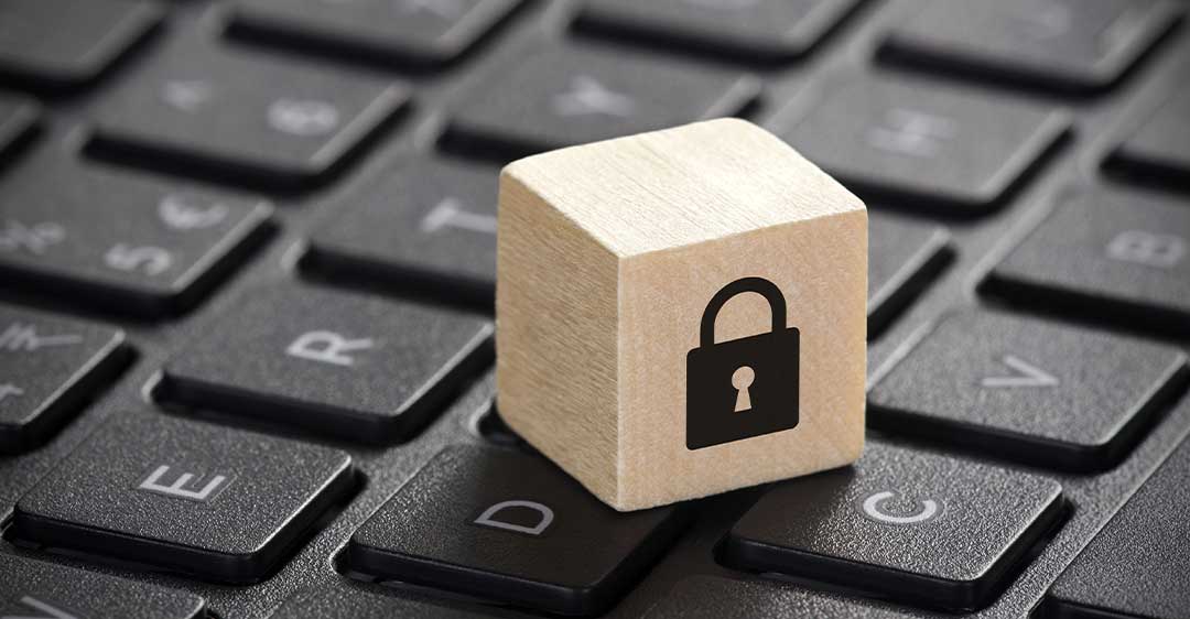 wooden cube with padlock icon sitting on keyboard, Florida Consumer Privacy Law legislation